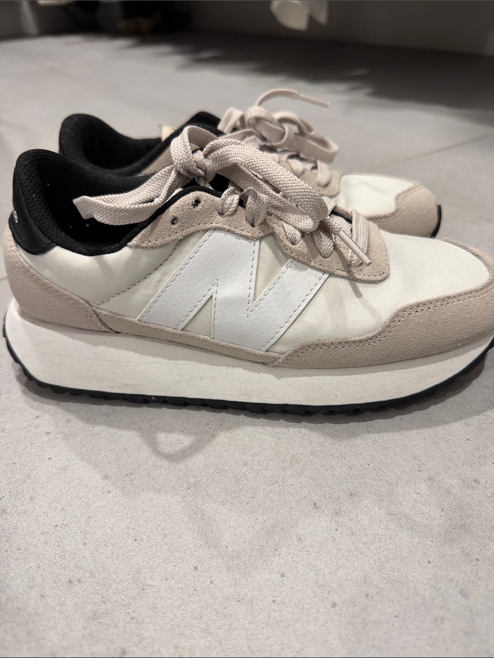 New Balance Women’s Cream and White Platform Sneakers